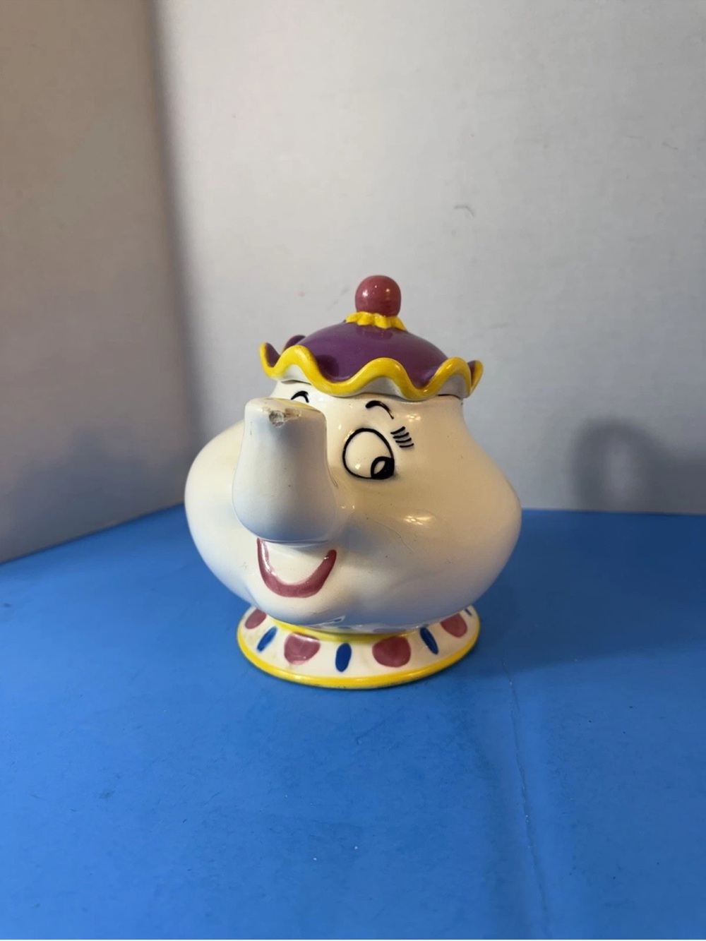 Ceramic piggy bank from the cartoon *Beauty and the Beast*